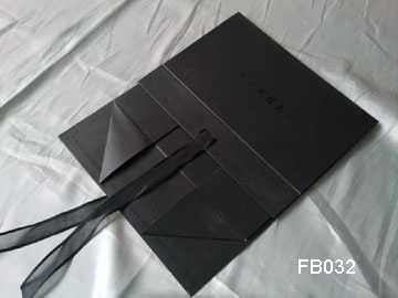 Folded Black Gift Box with Black Ribbon