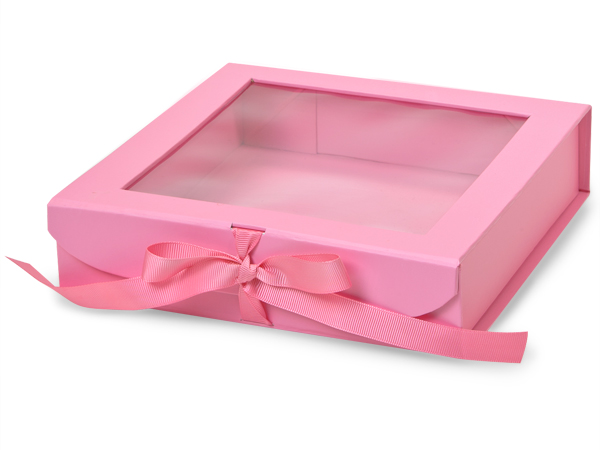 Pink gift box with windows and ribbon